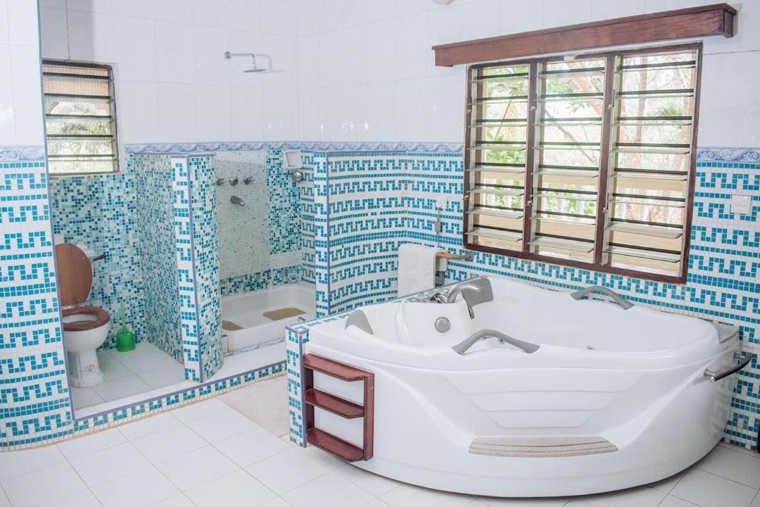 דיאני ביץ' Kijani Cottages Diani מראה חיצוני תמונה