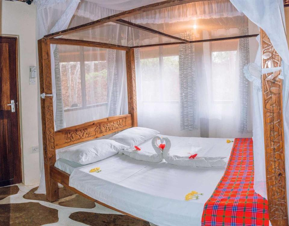 דיאני ביץ' Kijani Cottages Diani מראה חיצוני תמונה