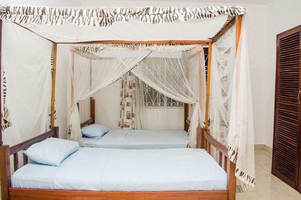 דיאני ביץ' Kijani Cottages Diani מראה חיצוני תמונה